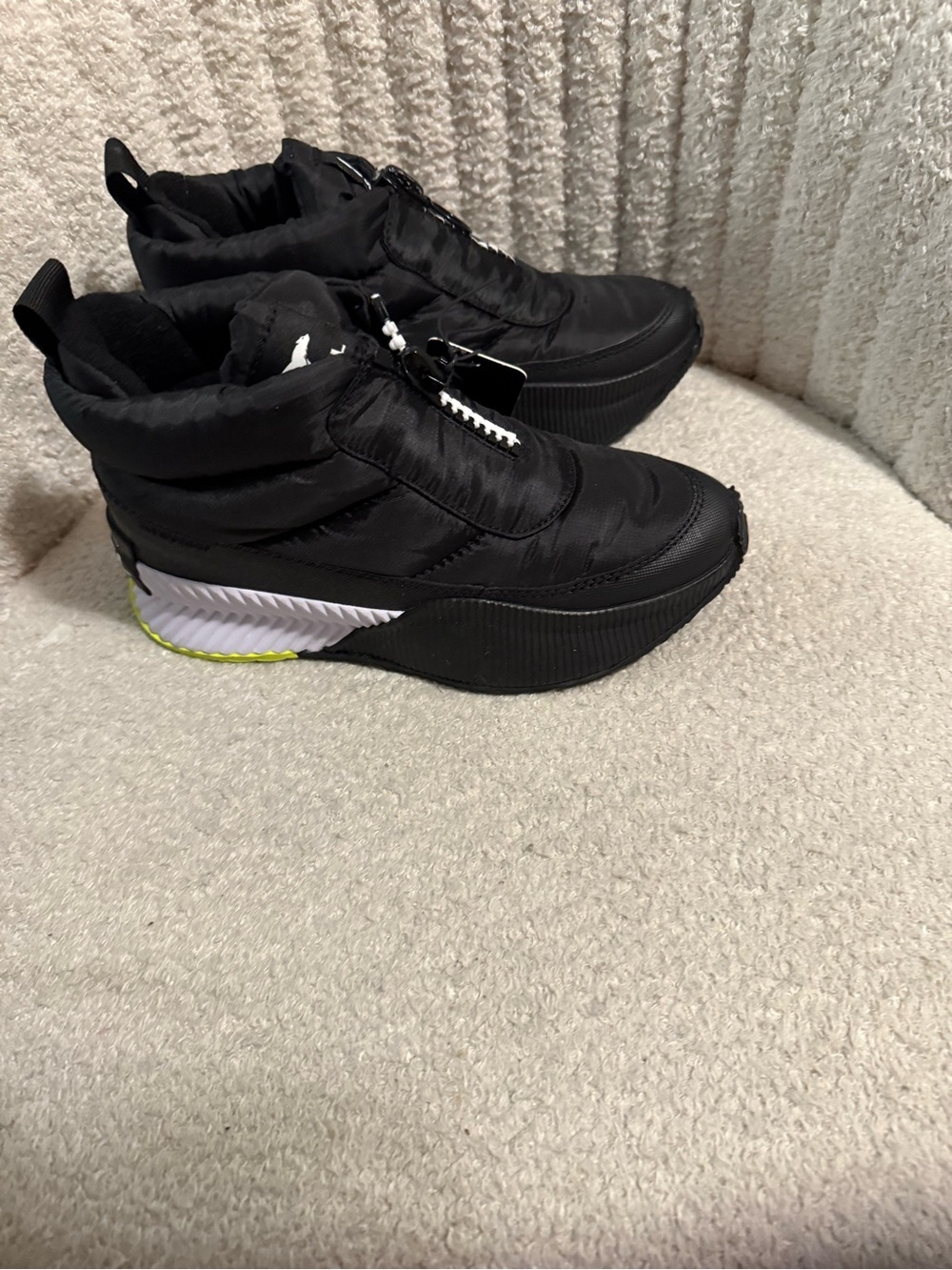 Sorel Black Quilted Slip-On Sneakers with White & Neon Yellow Accent